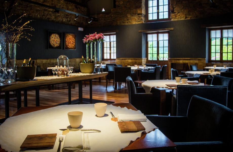 10 Best Restaurants in the World – Asador Etxebarri in Spain perfects wood-fired cooking, highlighting natural flavors with smoky excellence.