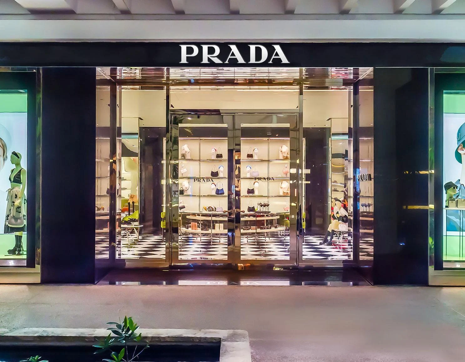10 Best Fashion Brands in the World - Prada: Symbol of minimalist elegance, offering high-quality fabrics, sleek tailoring, and iconic nylon bags.
