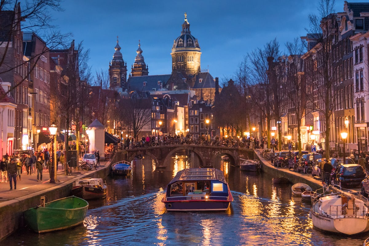 10 Top Cities in the World - Amsterdam’s historic canals, bicycles, and gabled houses reflecting Dutch charm.