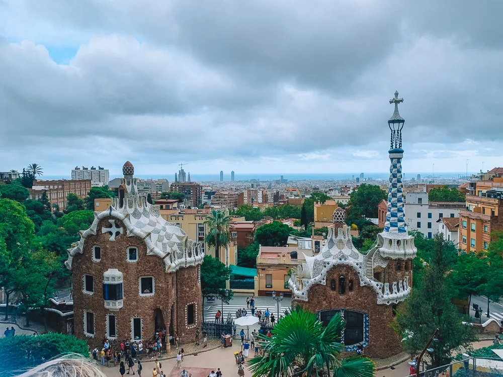 10 Top Cities in the World - Colorful Barcelona skyline with Gaudi architecture and Mediterranean coast.
