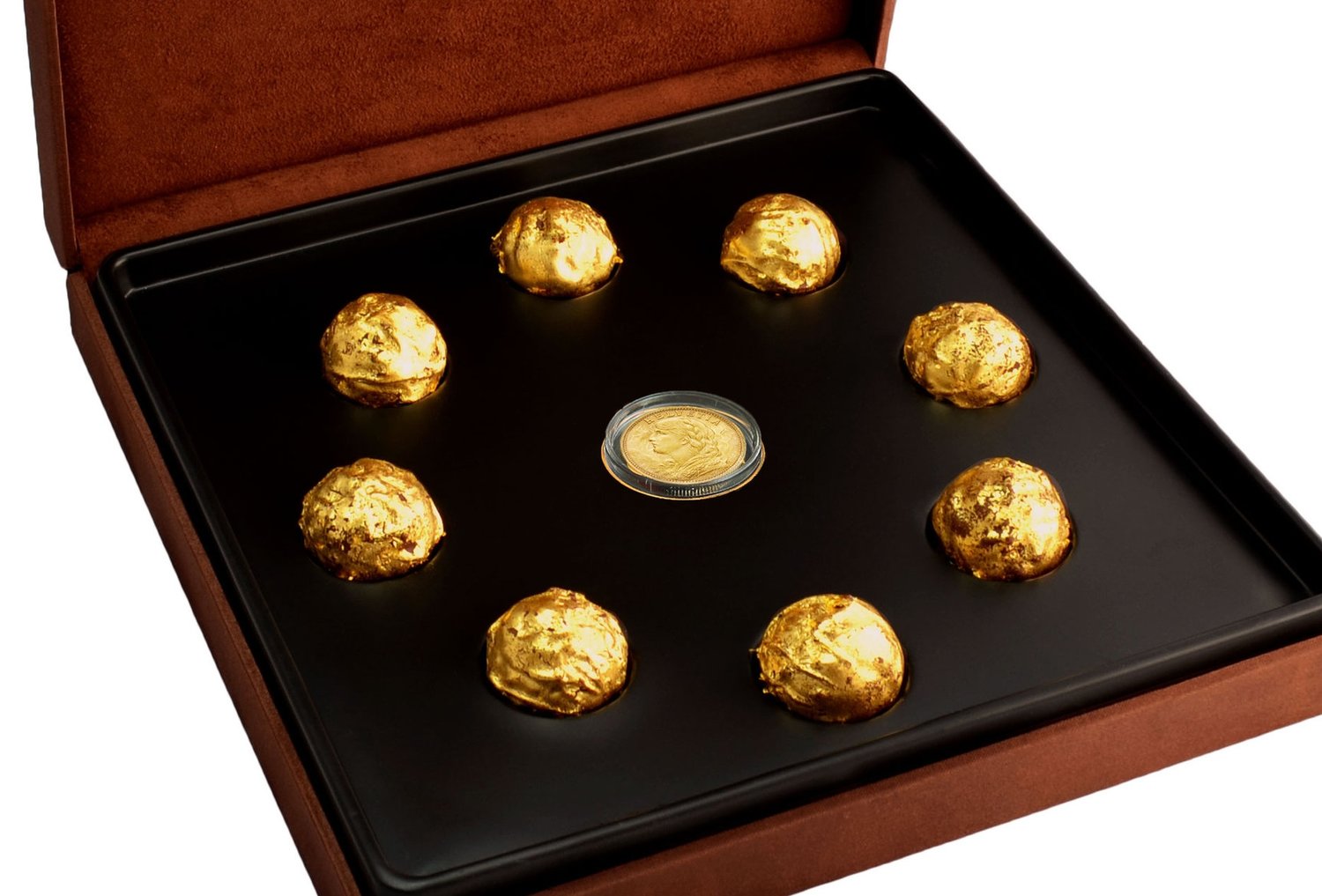 DeLafée Gold Chocolate Box from 10 Most Expensive Chocolates in the world featuring edible gold leaf truffles.