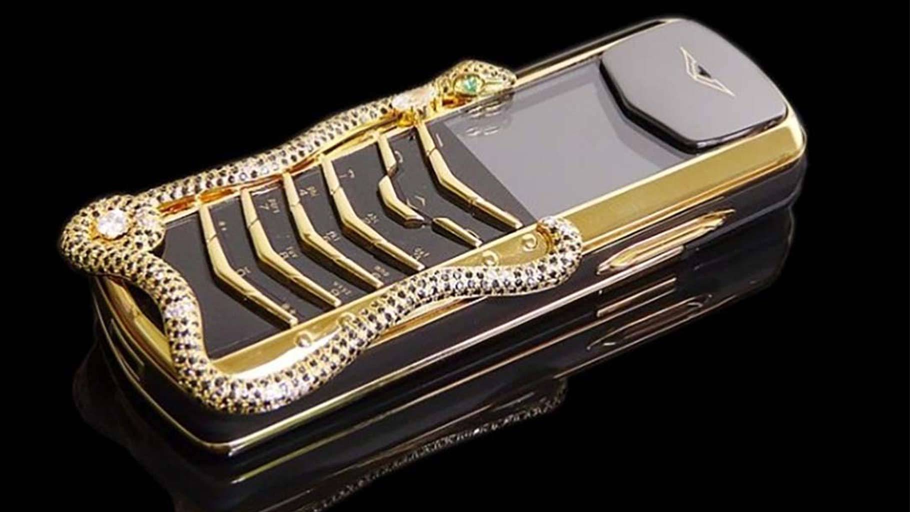 Vertu Signature Cobra from the 10 most expensive phones in the world, adorned with rubies, emeralds, and unique snake design.