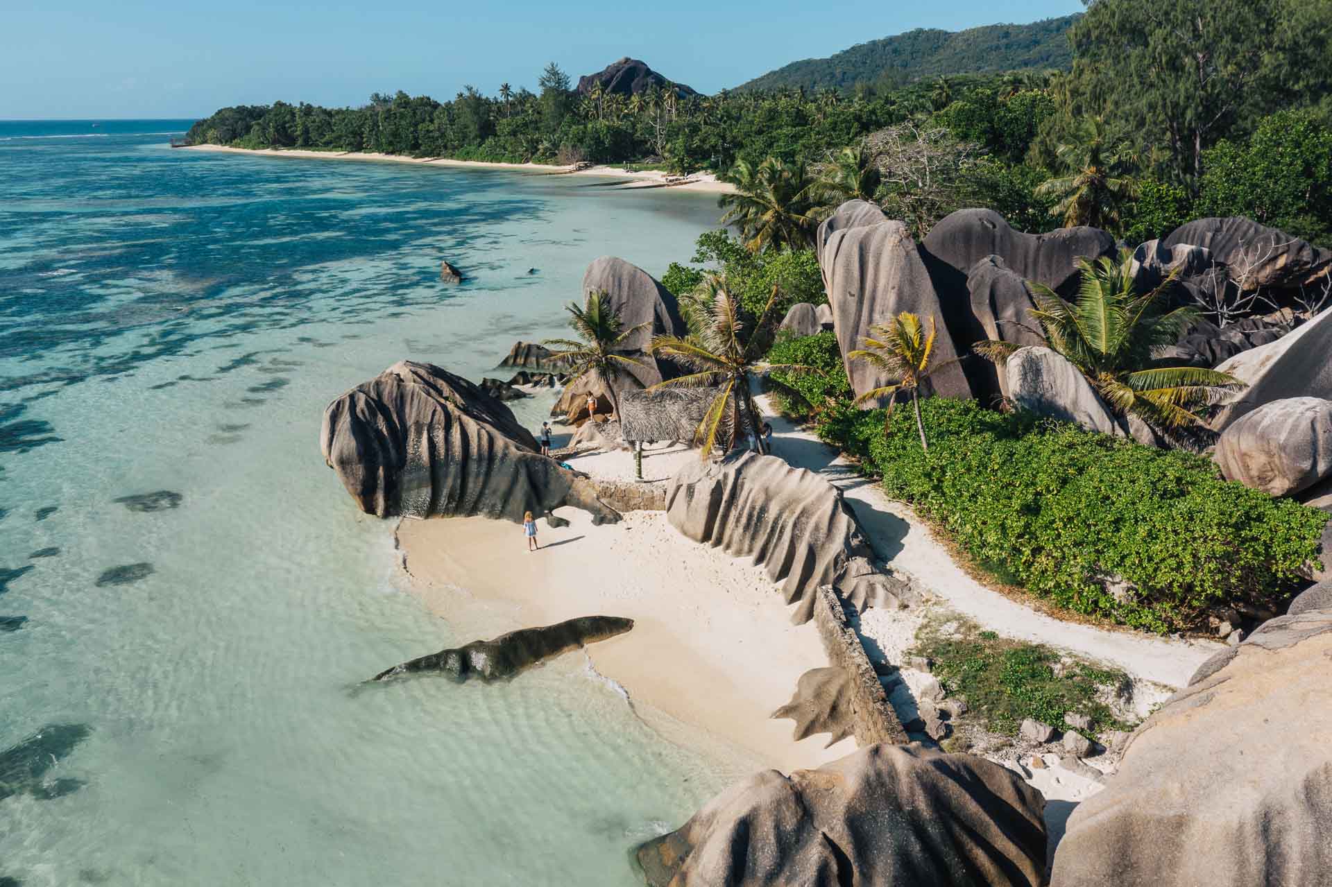 10 Best Beaches in the World – Anse Source d’Argent framed by granite boulders and vibrant coral reefs.