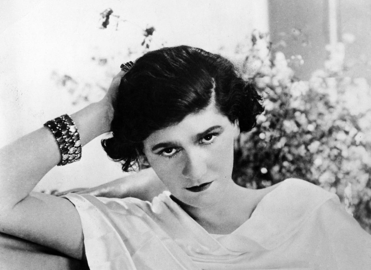 10 Top Fashion Designers in the World: Iconic designs by Coco Chanel shaping modern fashion.