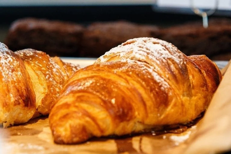 Buttery French croissant, a famous pastry in the 10 Best Food Dishes in the World, flaky and delicious.