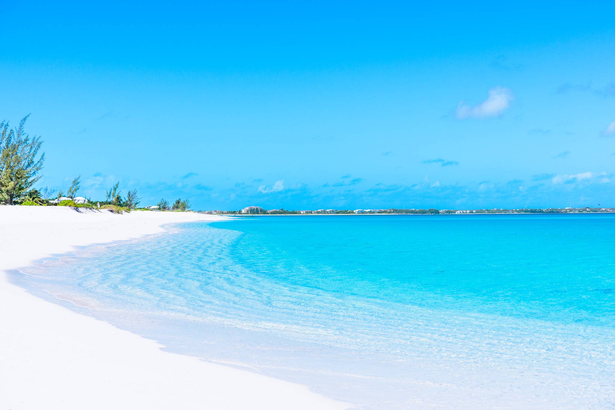 10 Best Beaches in the World – Grace Bay Beach with powdery white sand and turquoise Caribbean waters.