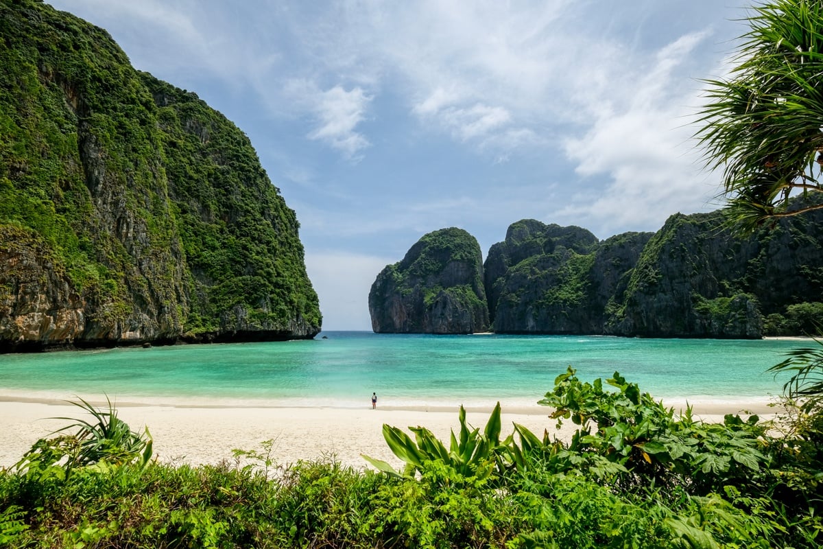 10 Best Beaches in the World – Maya Bay with emerald lagoon, lush cliffs, and famous movie backdrop.