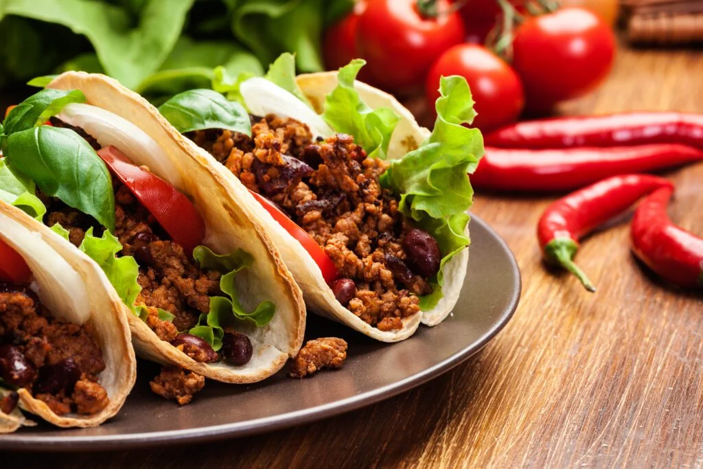 Spicy Mexican tacos featured in the 10 Best Food Dishes in the World, bursting with flavors and crunch.