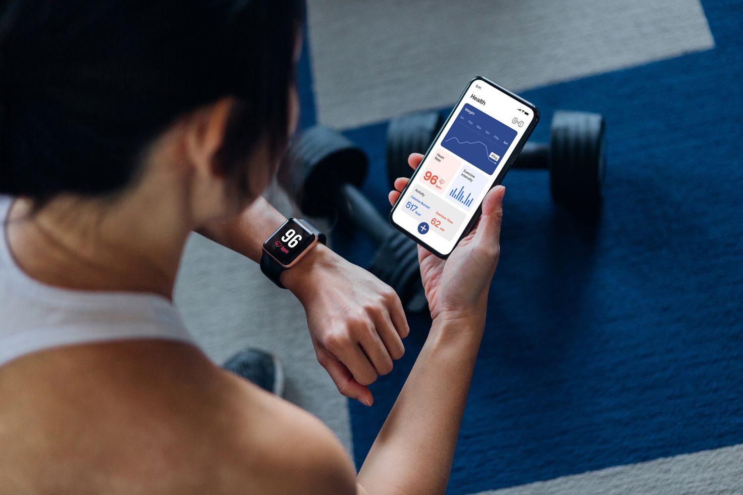 10 Top Fitness Trends in the World - Smart fitness watch tracking heart rate, steps, and calories during a run.