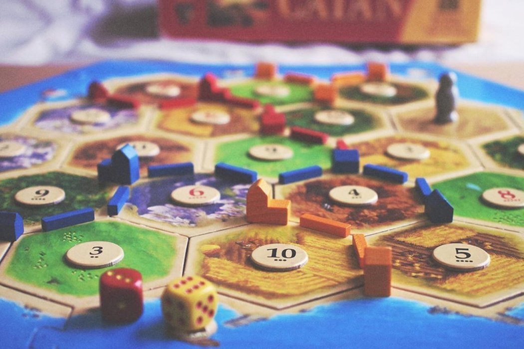 Catan board game with hex tiles and resources from the 10 Most Popular Board Games in the World selection.