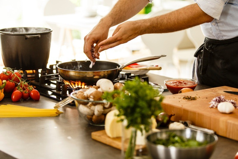 Homemade food and baking essentials symbolizing cooking as one of the 10 Most Popular Hobbies in the World for food lovers.