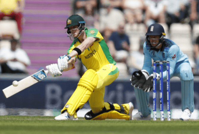 Cricketer hitting a ball in an international match, showing Cricket's reach in the 10 Most Popular Sports in the World.