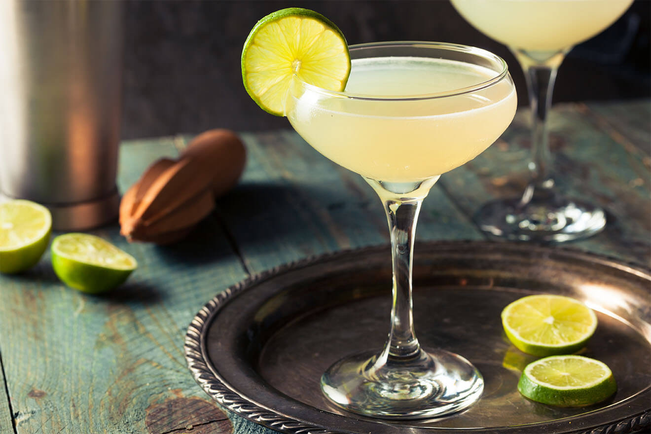 Daiquiri in a coupe glass – citrusy and smooth, this Cuban classic is one of the 10 Most Popular Cocktails in the World for summer vibes.