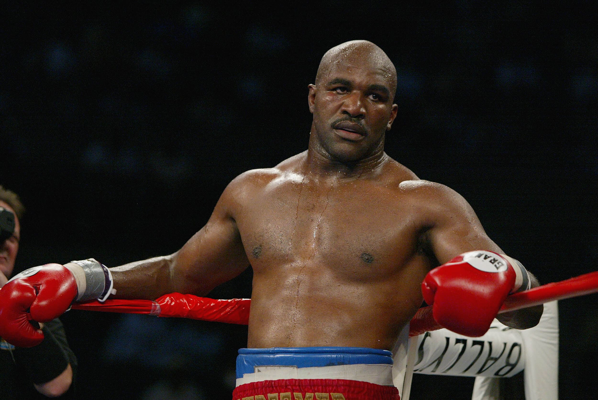 Evander Holyfield, featured among the 10 Most Famous Boxers in the World, famous for heart and warrior spirit in the ring.