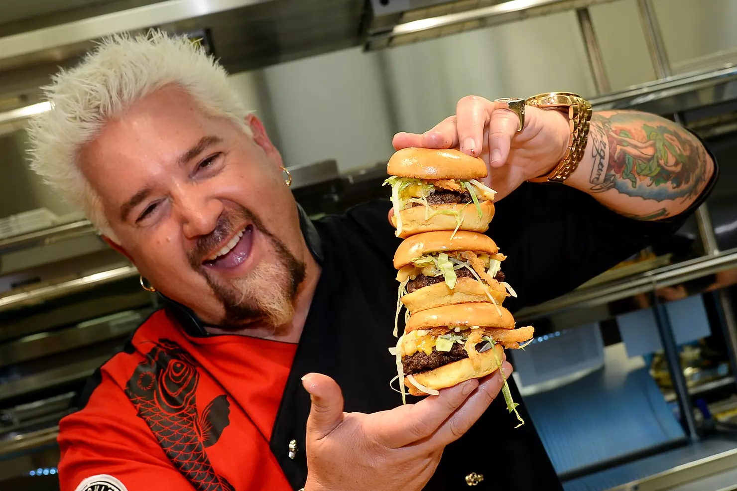 Guy Fieri at Diners, Drive-Ins and Dives set – one of the 10 Most Famous Chefs in the World known for bold American flavors.