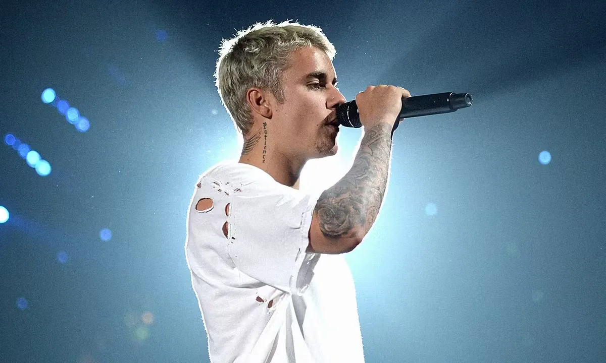 Justin Bieber in concert, one of the 10 Most Famous Musicians in the World with massive pop influence.