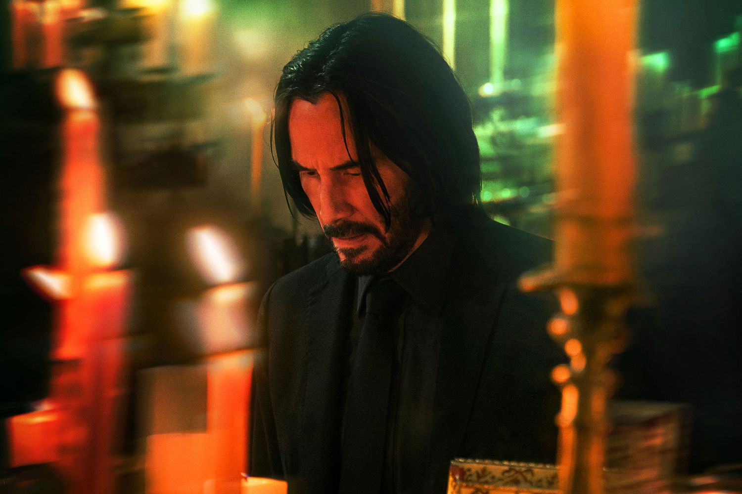 Keanu Reeves photo highlighting one of the 10 Most Famous Actors in the World with cult classic movies.