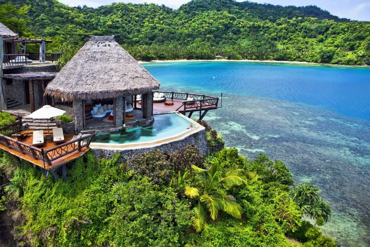 Laucala Island Fiji – tropical luxury and organic farms, a standout in the 10 Most Famous Private Islands in the World.