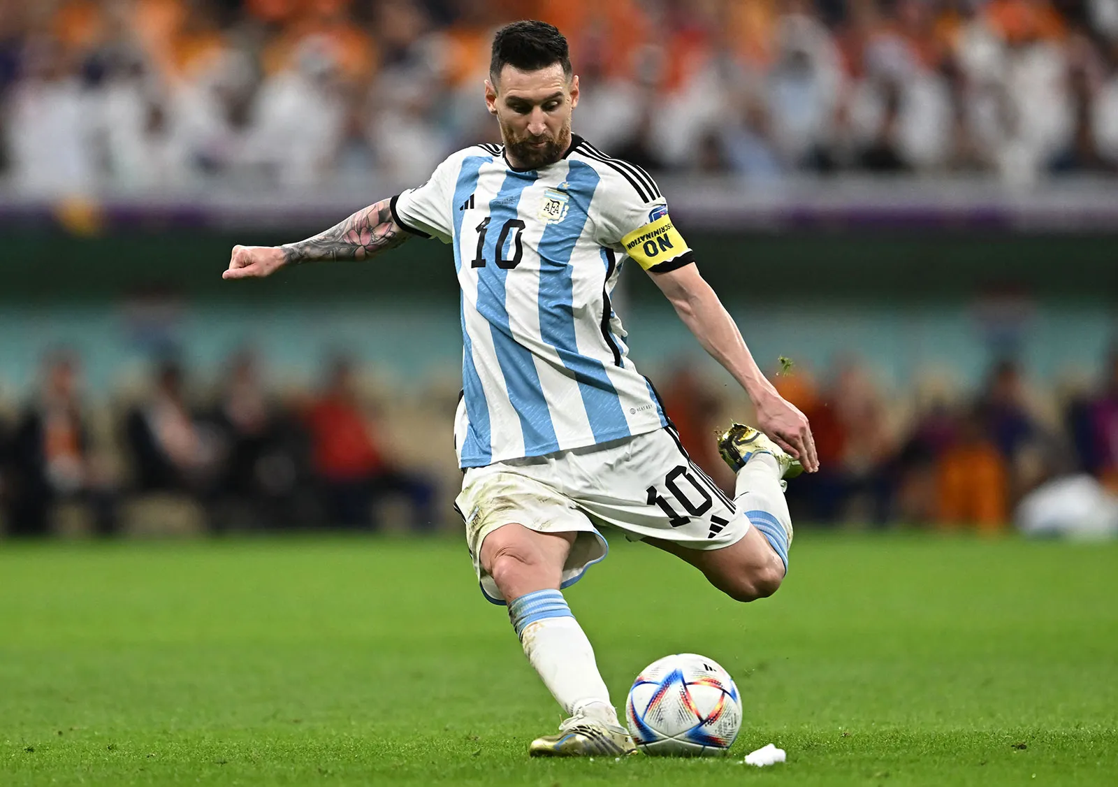 Lionel Messi action shot – Top 10 Most Famous Athletes in the World, iconic footballer and multiple Ballon d’Or winner.