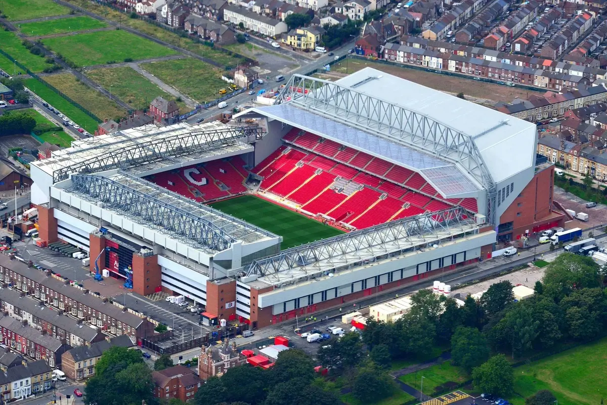 Liverpool FC stadium and emblem showcasing one of the 10 Most Famous Football Clubs in the World with iconic European success.