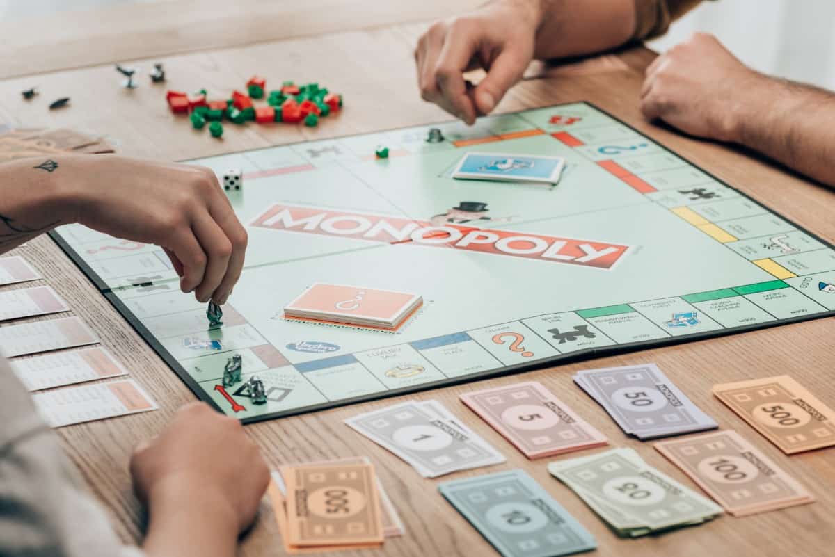 Monopoly board showing iconic properties and tokens from the 10 Most Popular Board Games in the World.