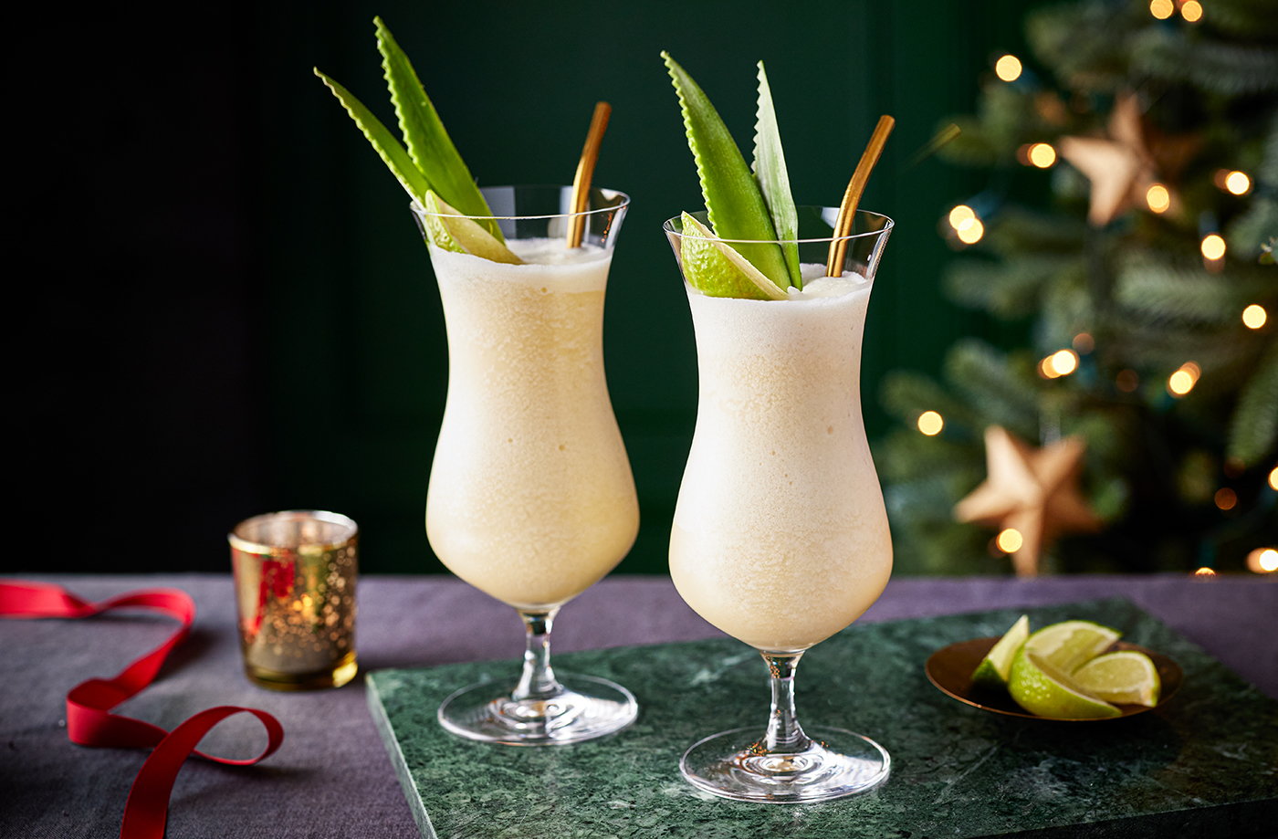 Piña Colada with pineapple slice – a creamy tropical drink in the 10 Most Popular Cocktails in the World with coconut and rum base.