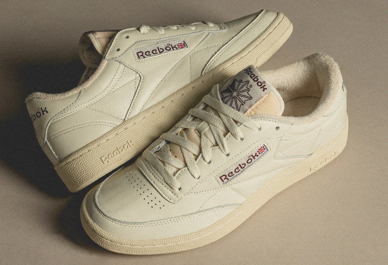 Reebok Club C 85 included in the 10 Most Popular Shoes in the World, praised for clean design and heritage appeal.
