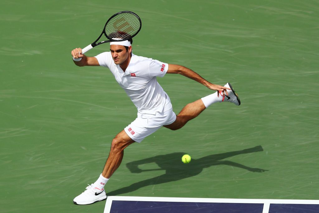 Roger Federer on court – Top 10 Most Famous Athletes in the World, tennis legend with numerous Grand Slam titles.