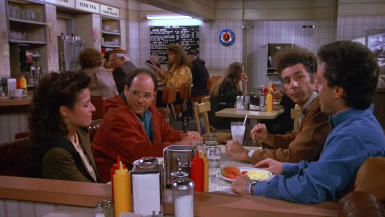 Iconic diner moment with Jerry and friends from Seinfeld – one of the 10 Most Popular TV Shows of all Time.
