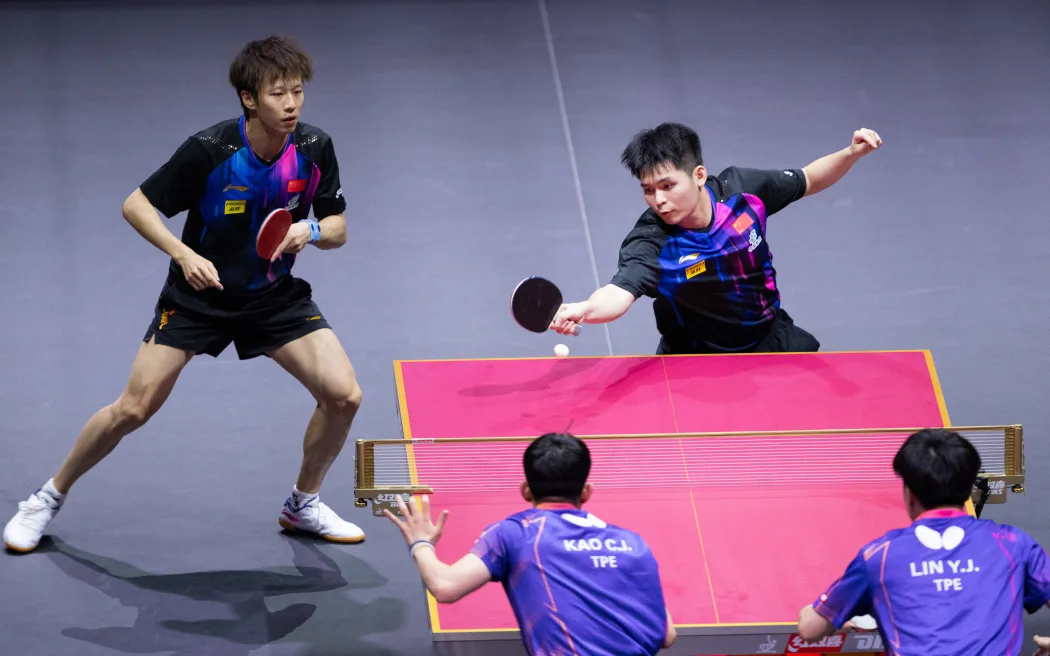 Table tennis match at Olympic level, featuring fast-paced action from the 10 Most Popular Sports in the World.