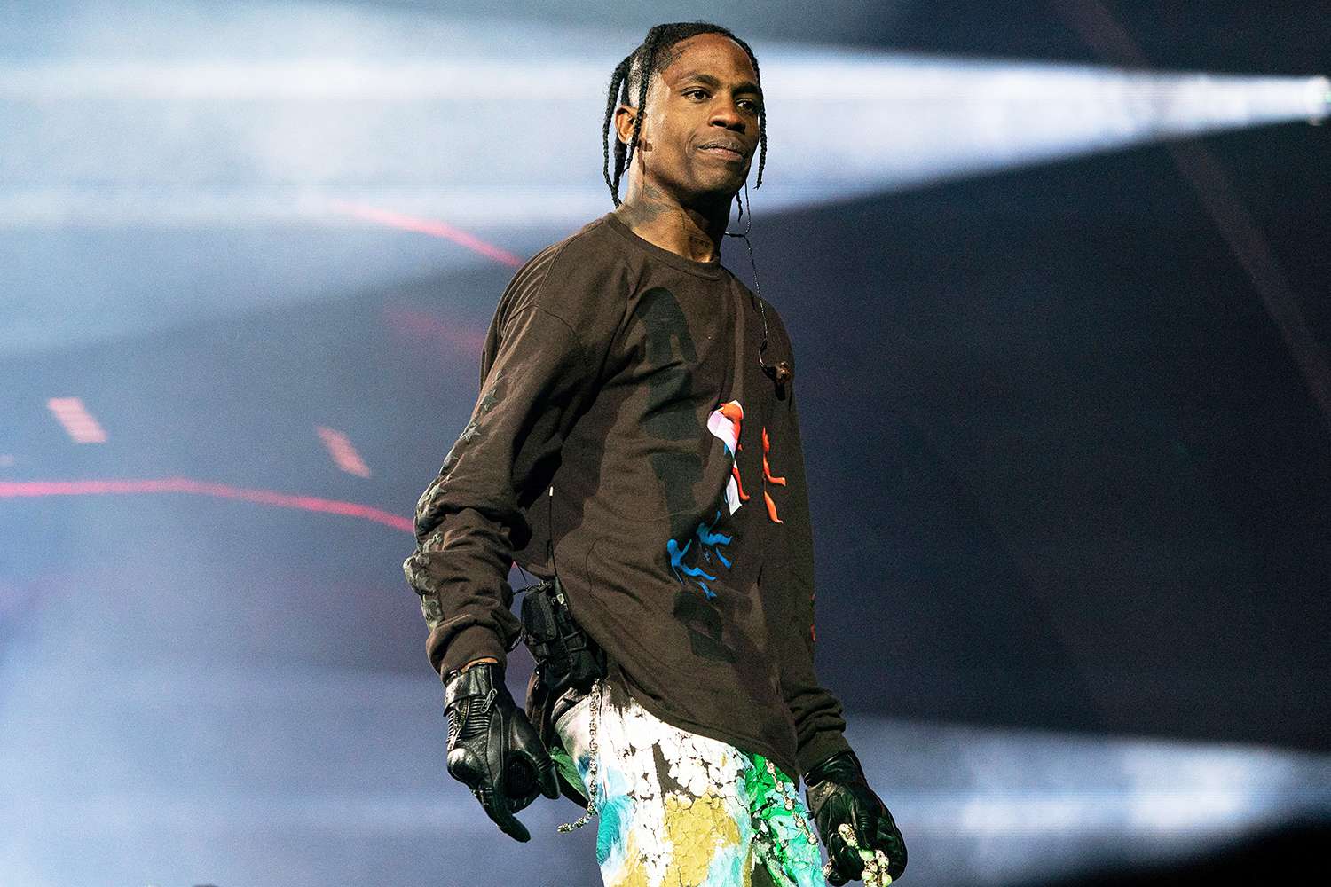 Travis Scott joins the 10 Most Famous Rappers in the World for his genre-bending sound and explosive live shows.