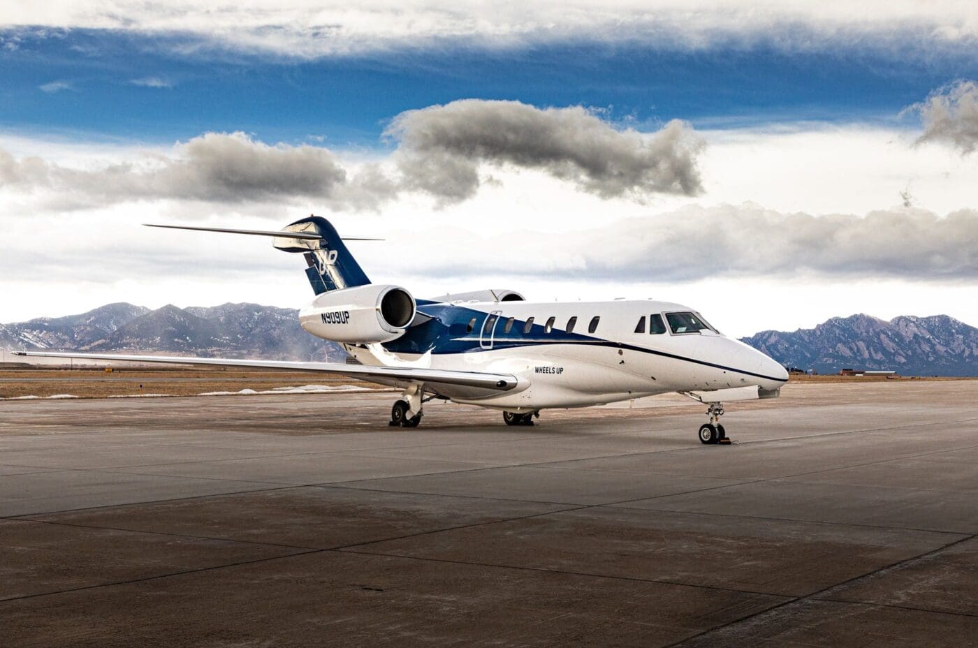 Wheels Up private aircraft ready for takeoff, part of the 10 Most Popular Private Jet Charters offering app-based access.