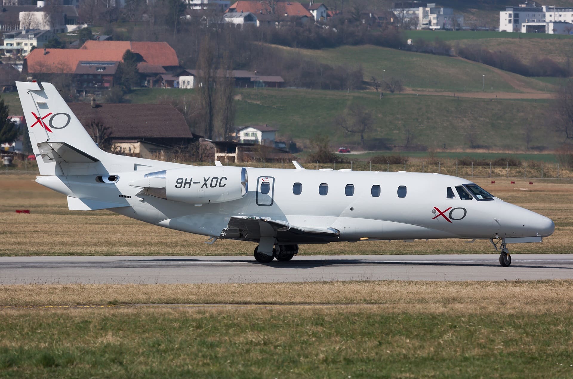 XO private jet on tarmac representing seamless booking in the 10 Most Popular Private Jet Charters category.