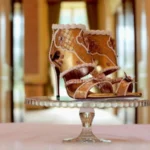 The 10 Most Expensive Shoes in the World including diamond heels, gold sneakers, and luxury designer footwear.