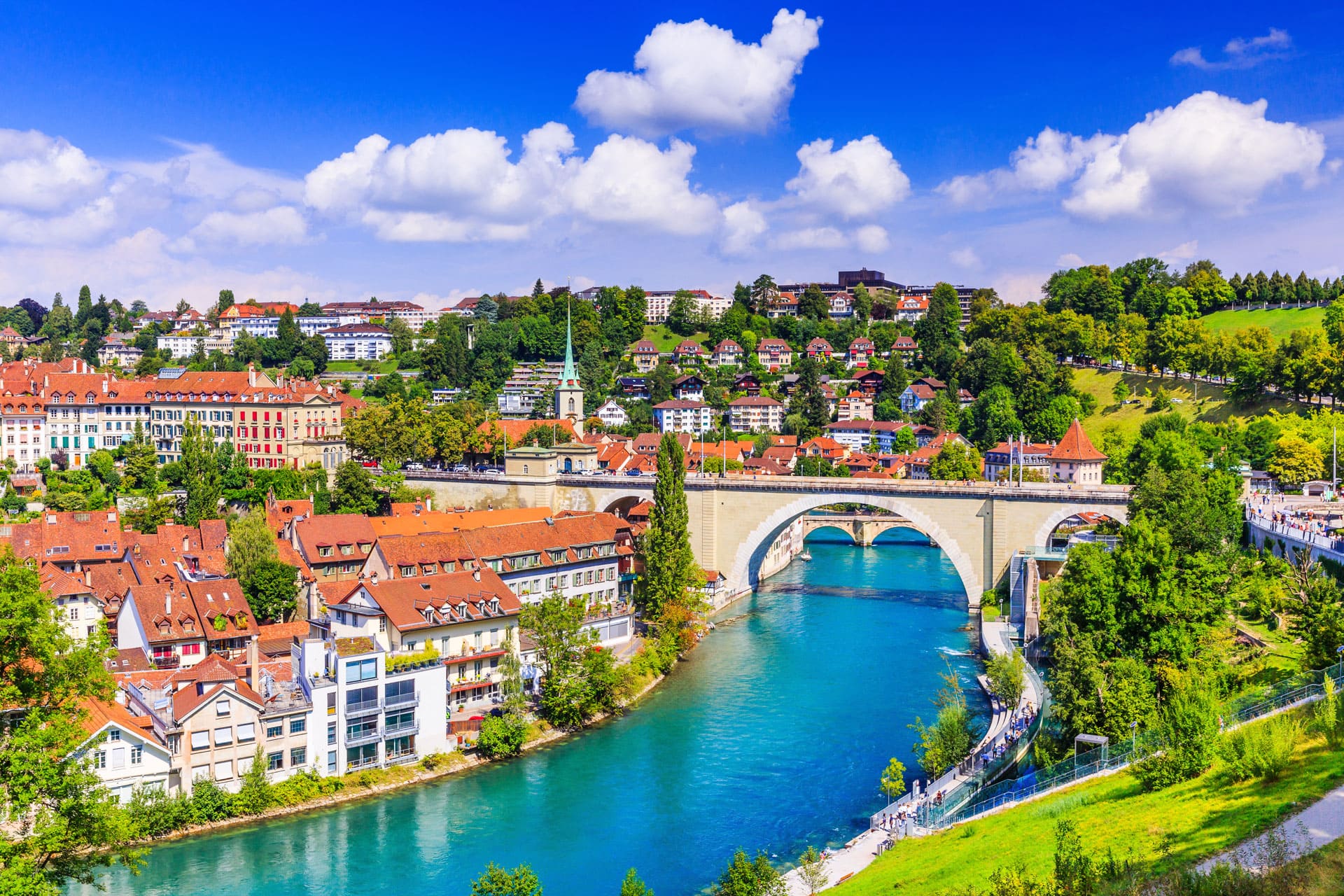 Old Town Bern and river under blue sky, included in the 10 Most Expensive Cities in the world.