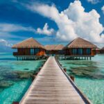 Complete Luxury Travel Buying Guide showcasing private jets, villas, and 5-star experiences across exotic global destinations.