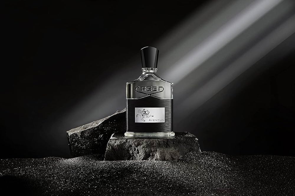 Creed Aventus perfume with royal black-and-silver packaging – Complete Luxury Perfumes Buying Guide for elite masculine scents.