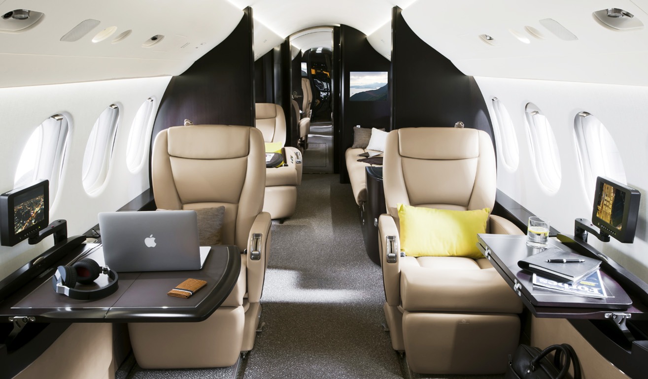 Dassault Falcon private jet interior in the Complete Luxury Private Jet Buying Guide emphasizing efficiency and French craftsmanship.