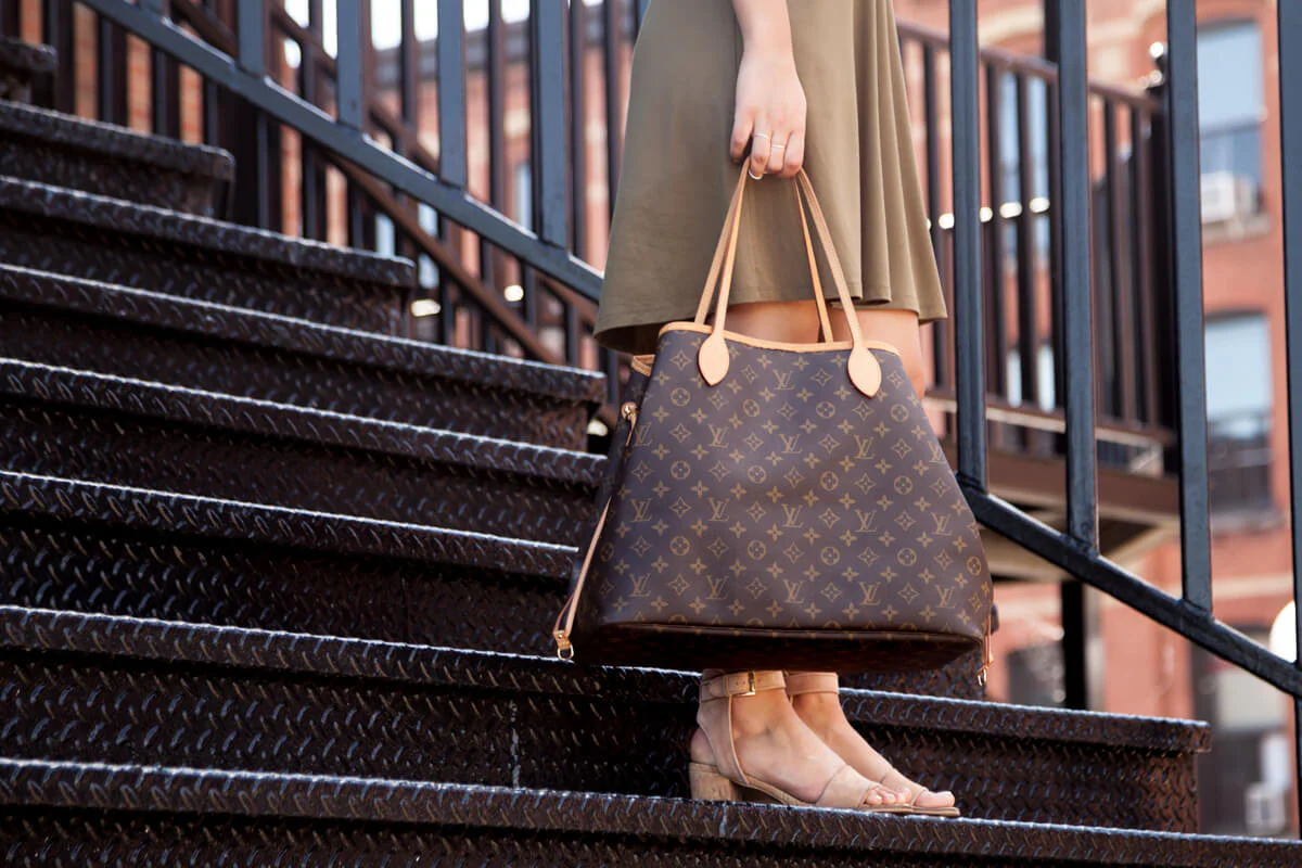 Louis Vuitton Neverfull tote in the Best Designer Handbags Buying Guide, ideal for everyday luxury and functionality.