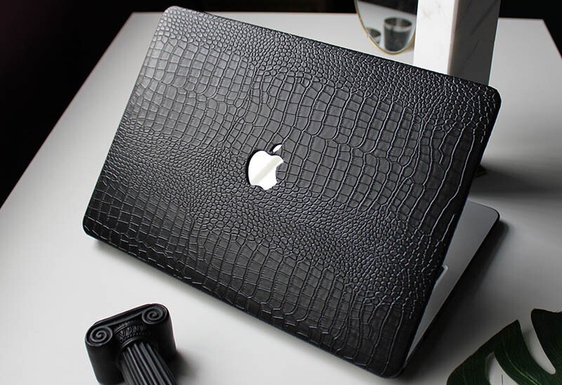 Complete Luxury Gadgets Buying Guide showing premium laptops and tablets with gold trim, sleek profiles, and powerful specs.