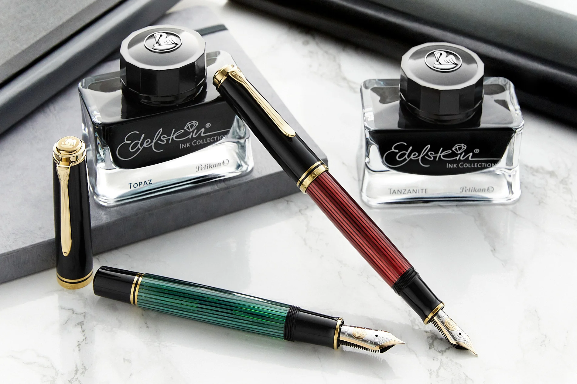Pelikan fountain pen displayed in the Complete Luxury Pens Buying Guide highlighting piston-fill system and vibrant barrel design.