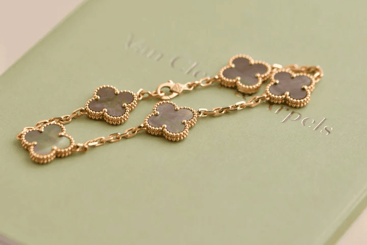 Van Cleef & Arpels Alhambra bracelet featured in the Ultimate Luxury Jewelry Buying Guide representing luck and refinement.
