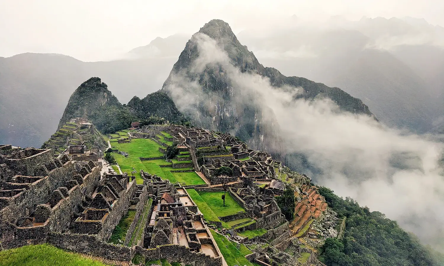 10 Best Travel Destinations in the World – Machu Picchu’s ancient Incan ruins surrounded by misty mountain peaks