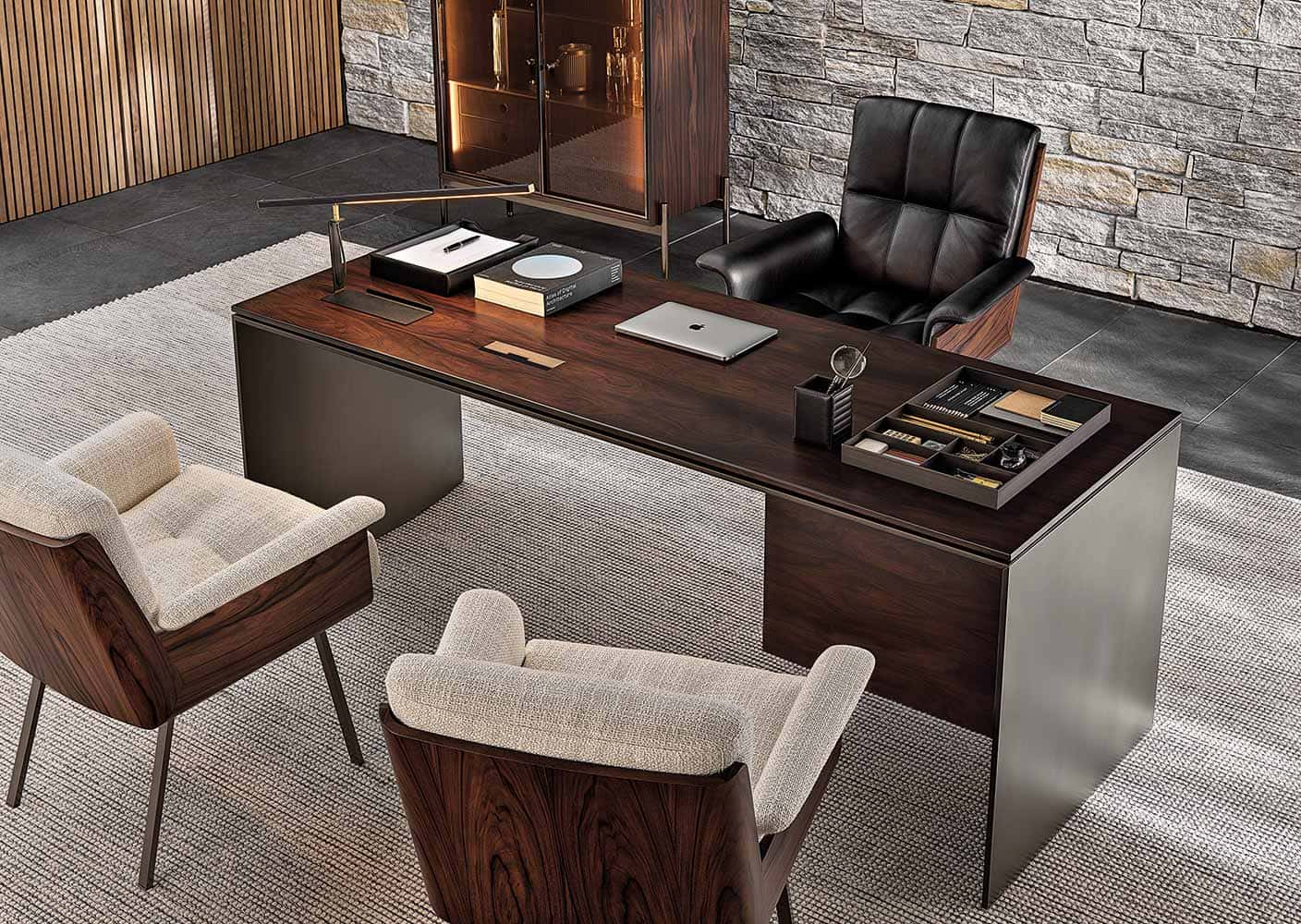 Mahogany executive desk and leather chair in a home office setting from Complete Luxury Furniture Buying Guide.